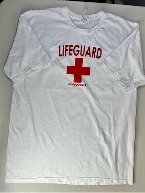 LIFEGUARD" graphic with red cross and "HAWAII" text underneath, size XL. Unisex